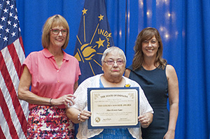 Photo of Alice Gass receiving the award