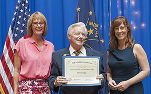 Photo of Daniel Hogan receiving the award