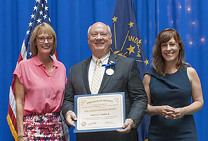 Photo of Frederick Taylor, Jr. receiving the award