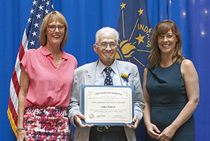 Photo of LeRoy Rothrock receiving the award