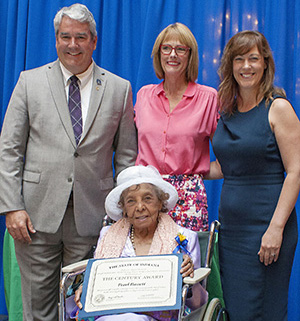 Photo of Pearl Bassett receiving the award