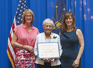 Photo of Susan Billings receiving the award