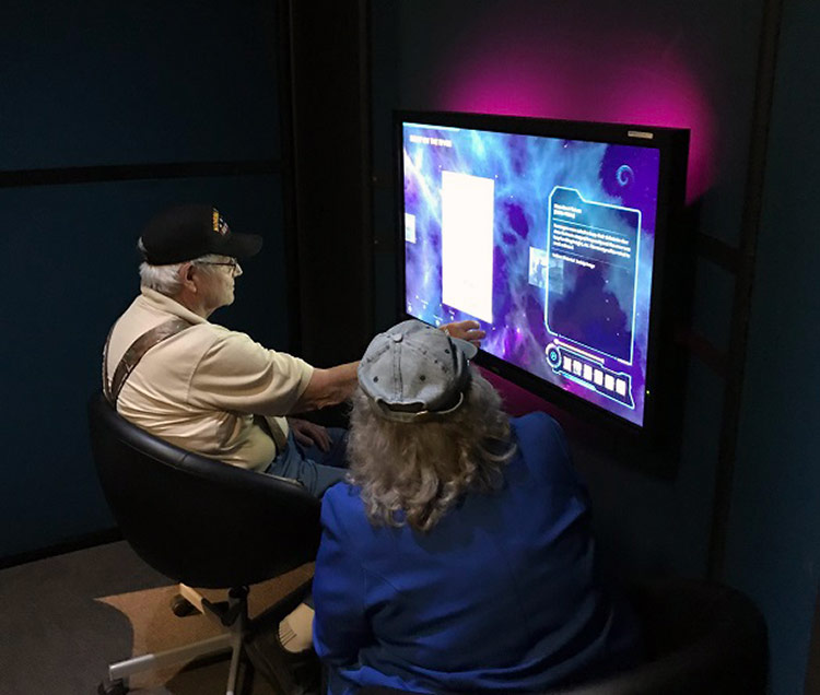 Picture of attendee at Destination Indiana exhibit