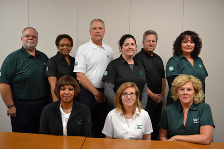 Members of the central DFR office show off the various shirt styles and colors.