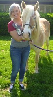 Photo of Katlyn with a horse