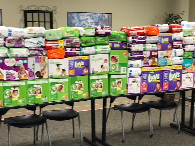 Stacks of diaper packages on a table