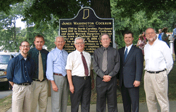 Stephen Berrey, Indiana Historical Bureau; Mayor Hugh Wirth, Oakland City; State Senator Lindel Hume; Rev. Les Coomer, applicant; Mark Coomer, Evansville Courier & Press; Congressman John Hostettler; Prof. Randy Mills, Oakland City University