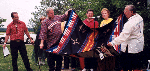 Presentation of the 'Code Talker' blanket to Charles Davis, the marker applicant, from the Dagenett family.