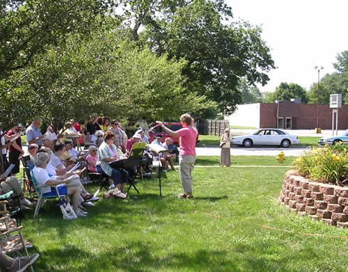 The North Manchester Community Choir, directed by Debbie Chinworth played music from the early 1900s for the ceremony. Diana Bucher played the keyboard.