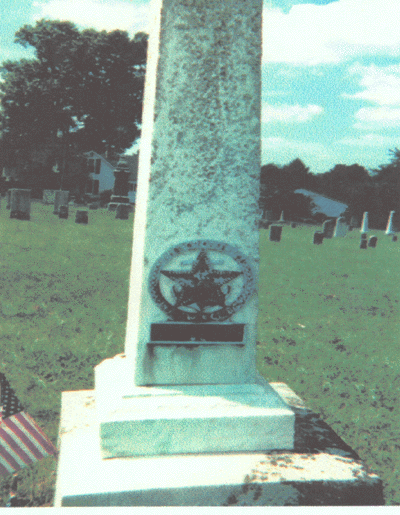 William Bratton's grave stone with War of 1812 insignia.