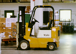 Photo of a fork truck and boxes at the Indiana State Records Center
