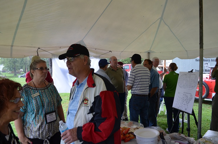 Stutz Marmon and Haynes collectors take shelter from the rain