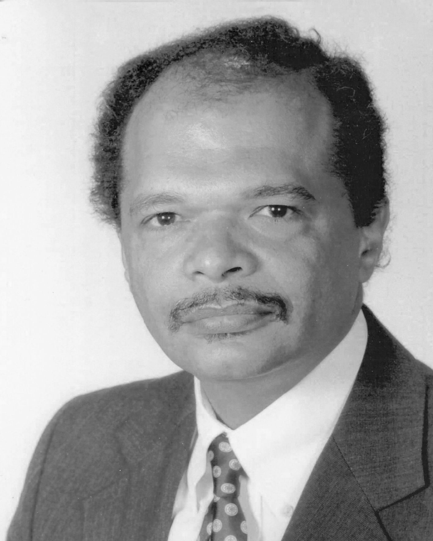 Headshot of Commissioner Aiken