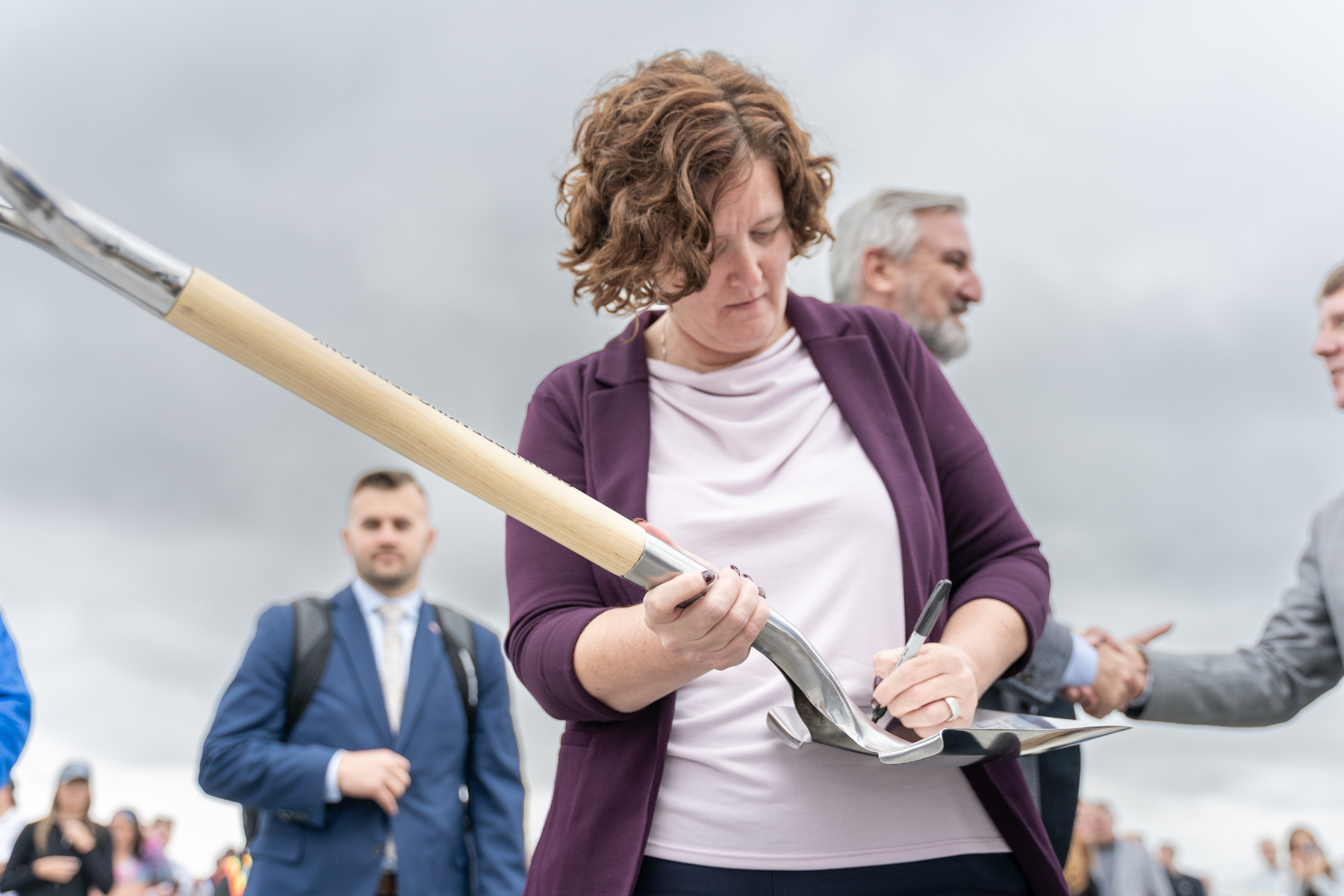 Indiana Department of Correction Commissioner Christina Reagle signs a commemorative shovel on Thursday, Sep. 28, 2023 during the groundbreaking ceremony for the new $1.2 Billion correctional facility under construction in Westville, Indiana. SCOTT ROBERSON | Indiana Department of Correction
