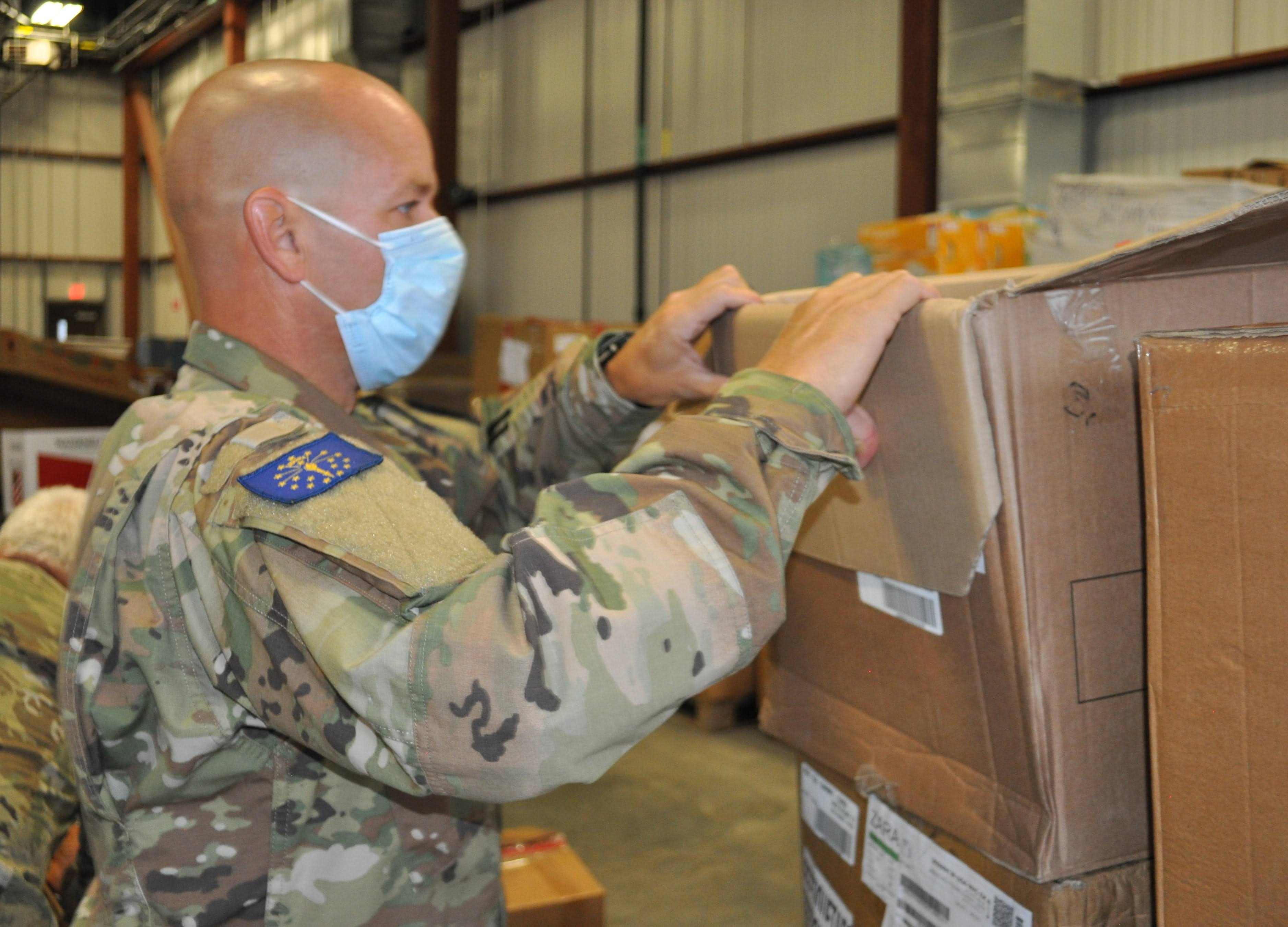 IGR Soldier moving boxes