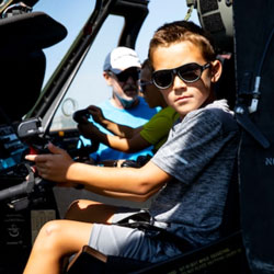 Kid in Military Vehicle