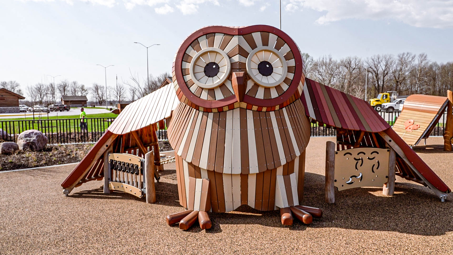 A children&rsquo;s playground that incorporates huge wooden owl