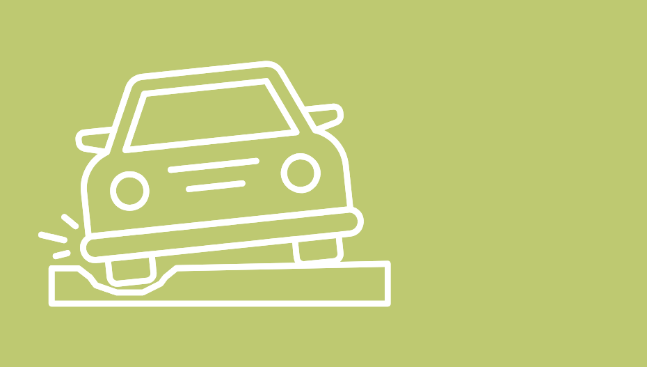 A car that is stuck in a rut