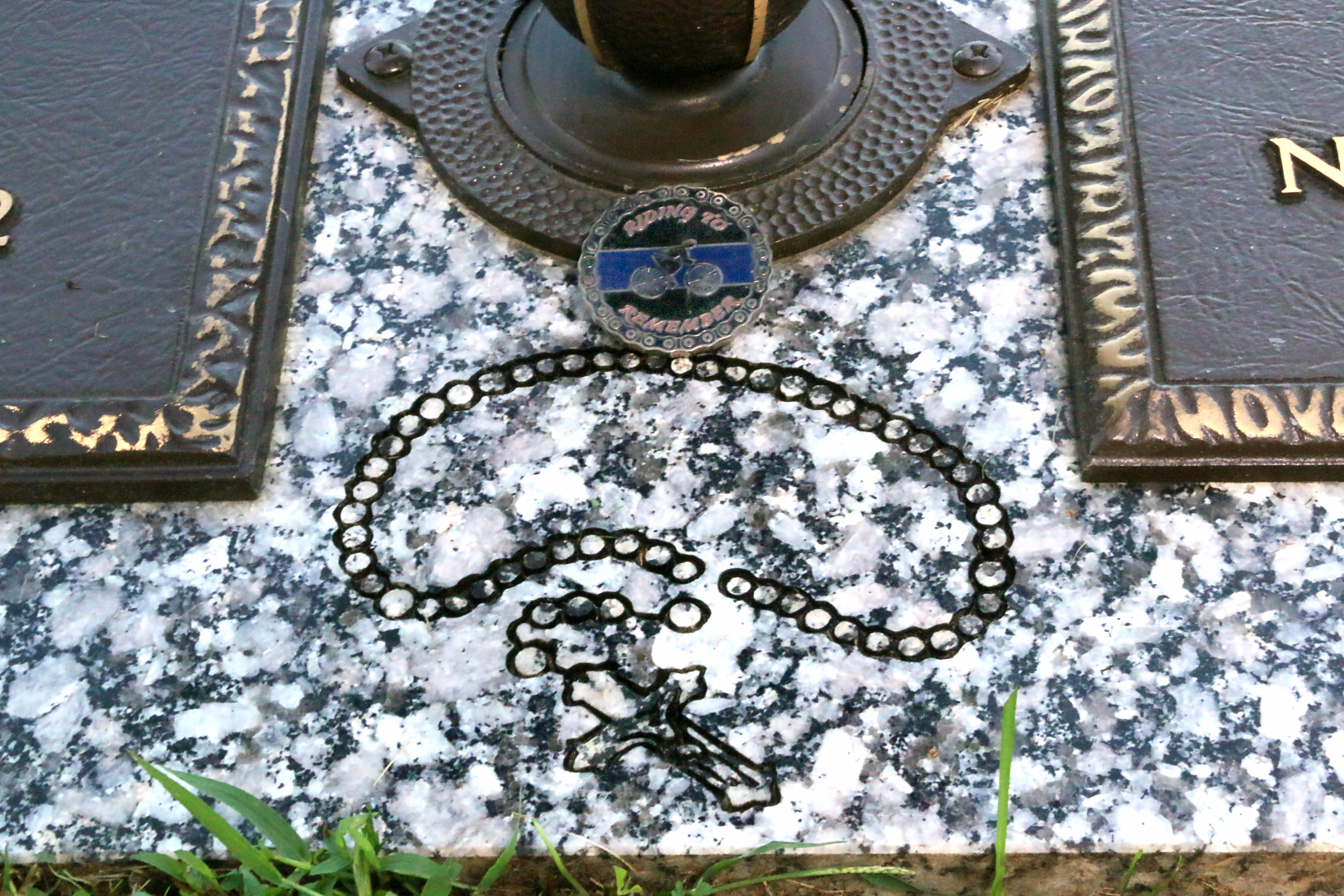 Headstone close-up - Rosary engraving