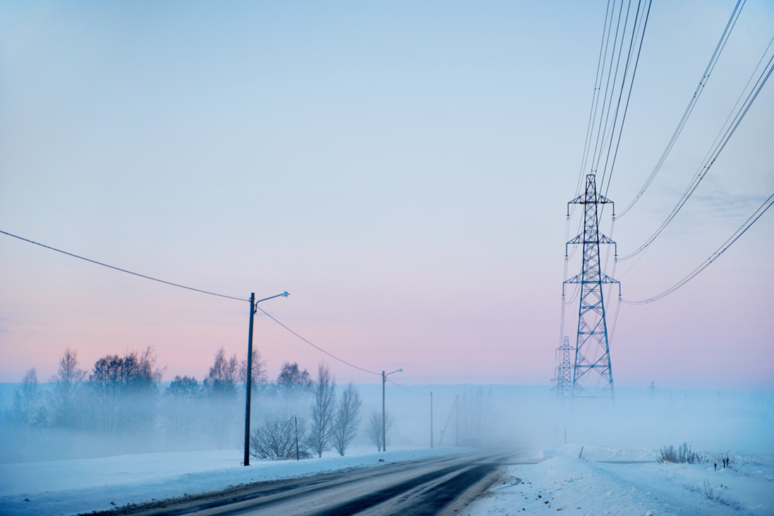Winter landscape with transmission lines.