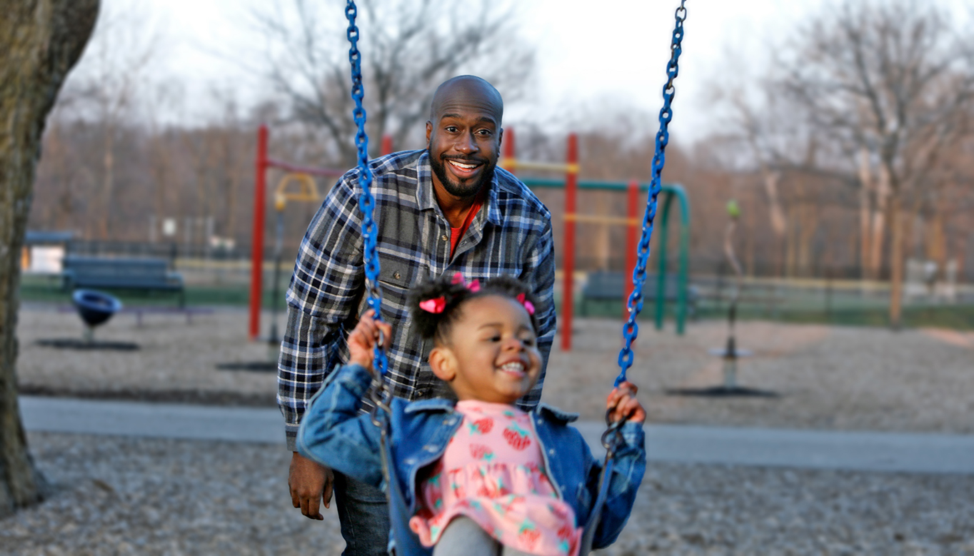 Dad and daughter at the playground