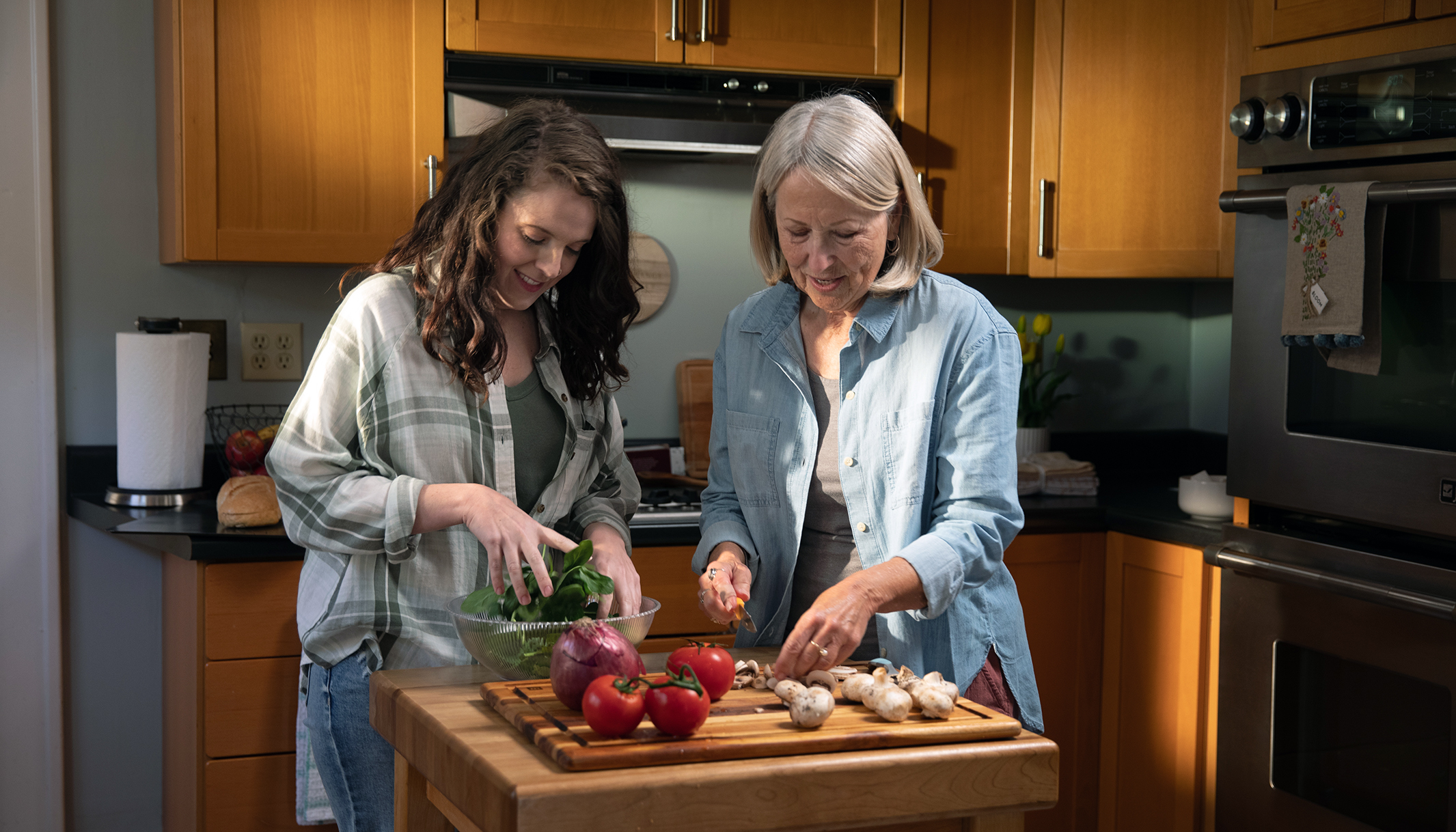 Mom and daughter cooking