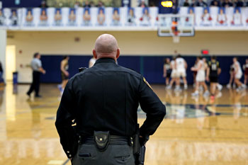 Officer at basketball game