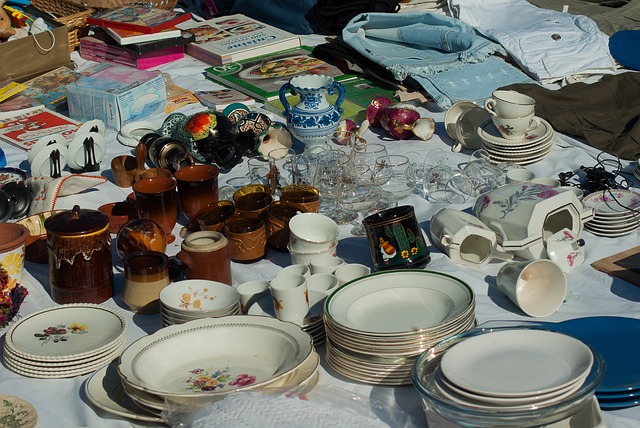 Table of assorted yard sale items