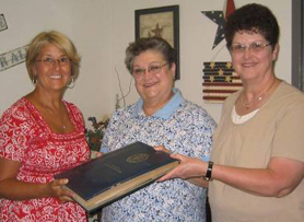 Sharon Dunsmore Gartell, Linda Dunsmore Augenstein, and present Clerk-Treasurer Maribeth Alspach
